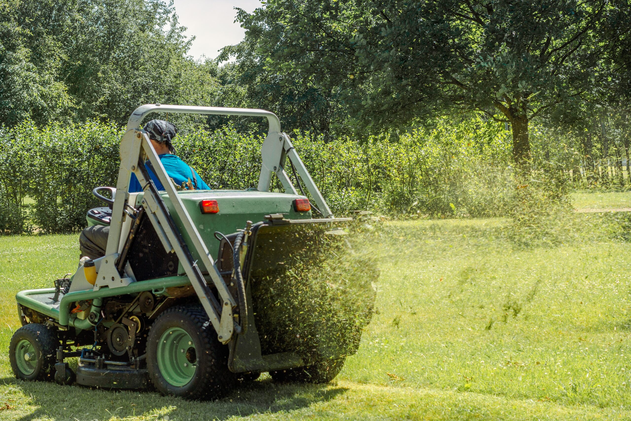 professional-gardener-cutting-green-grass-on-lawn-2026-03-24-06-16-48-utc